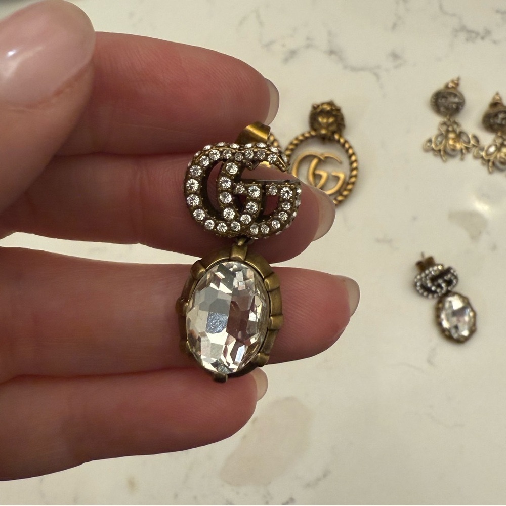 Three pairs of GG earrings. Elegant Gold and Silver Earrings - 3 pairs total - Picture 2 of 7